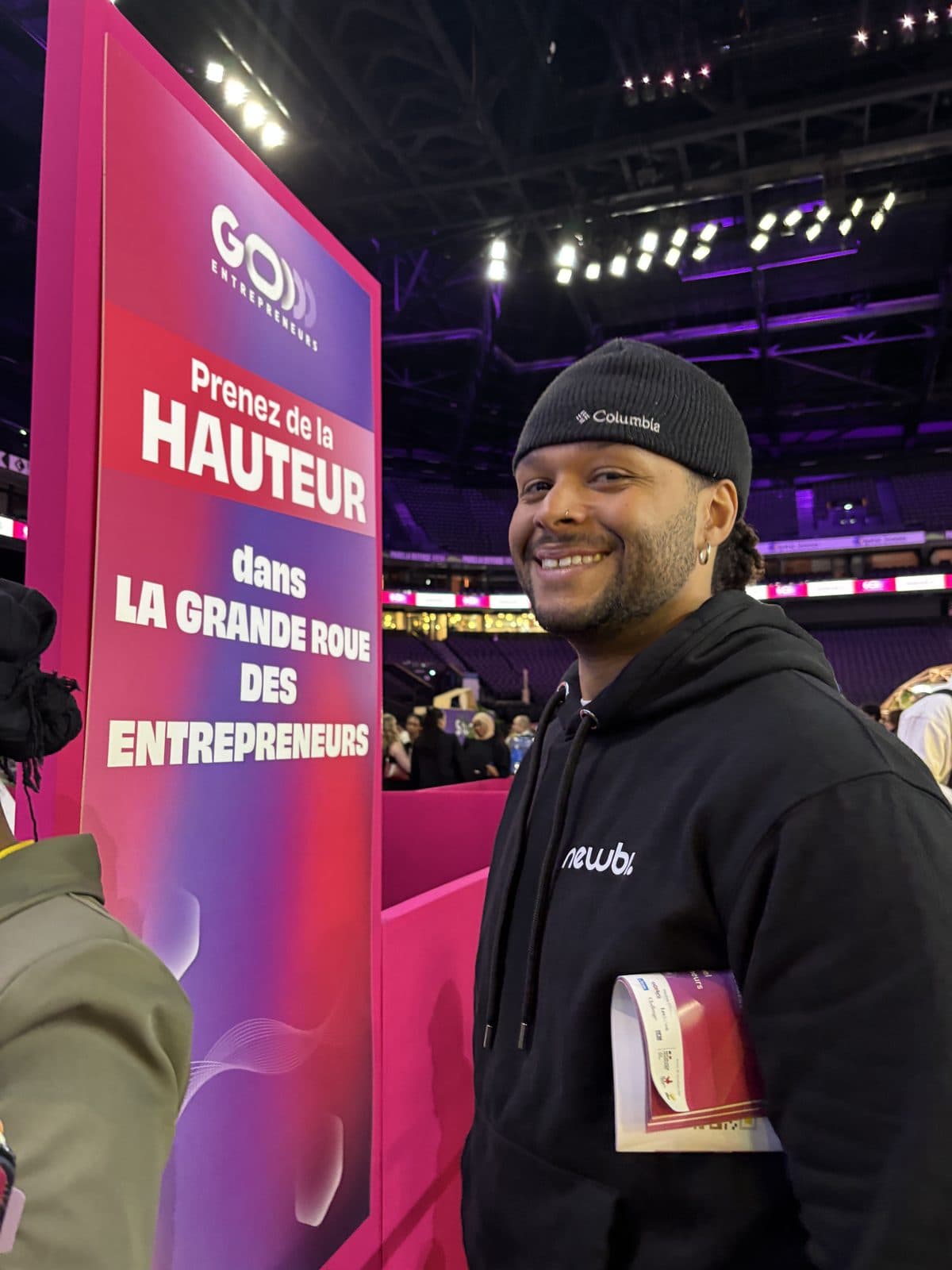 Un membre de l'équipe Newbi au salon Go Entrepreneurs